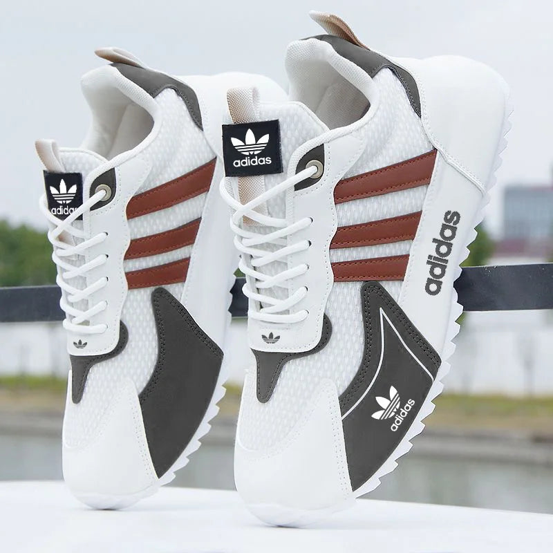 Priedušné športové bežecké topánky Adidas